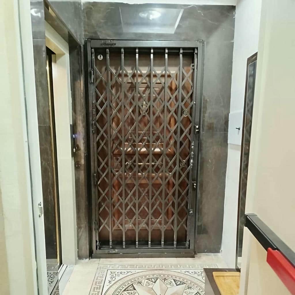 کارخانه درب حفاظ آکاردئونی پشت درب در محمدشهر