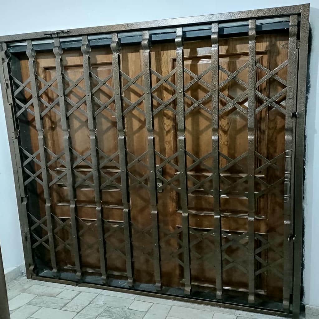 کارخانه درب حفاظ آکاردئونی آهنی در سمنان