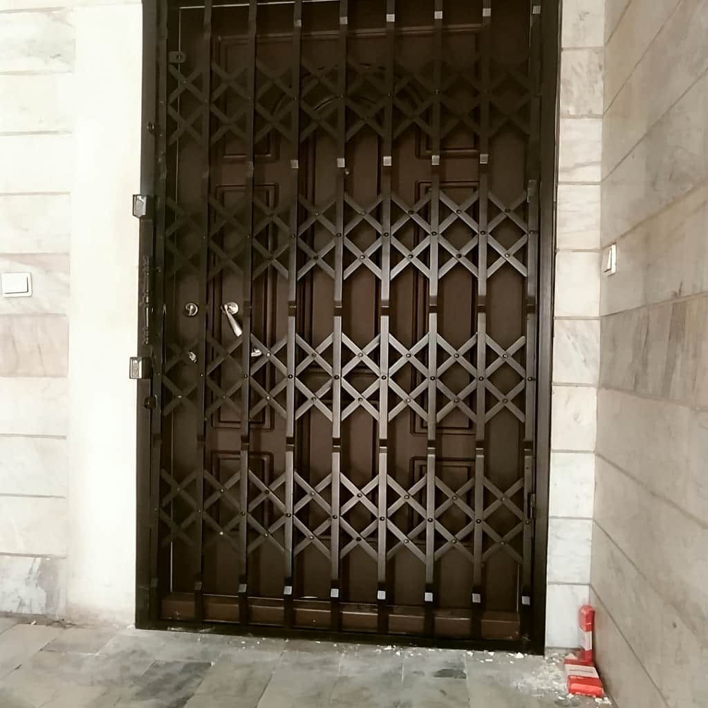 قیمت درب آکاردئونی چهار گل لوزی با ریل تقویت‌شده