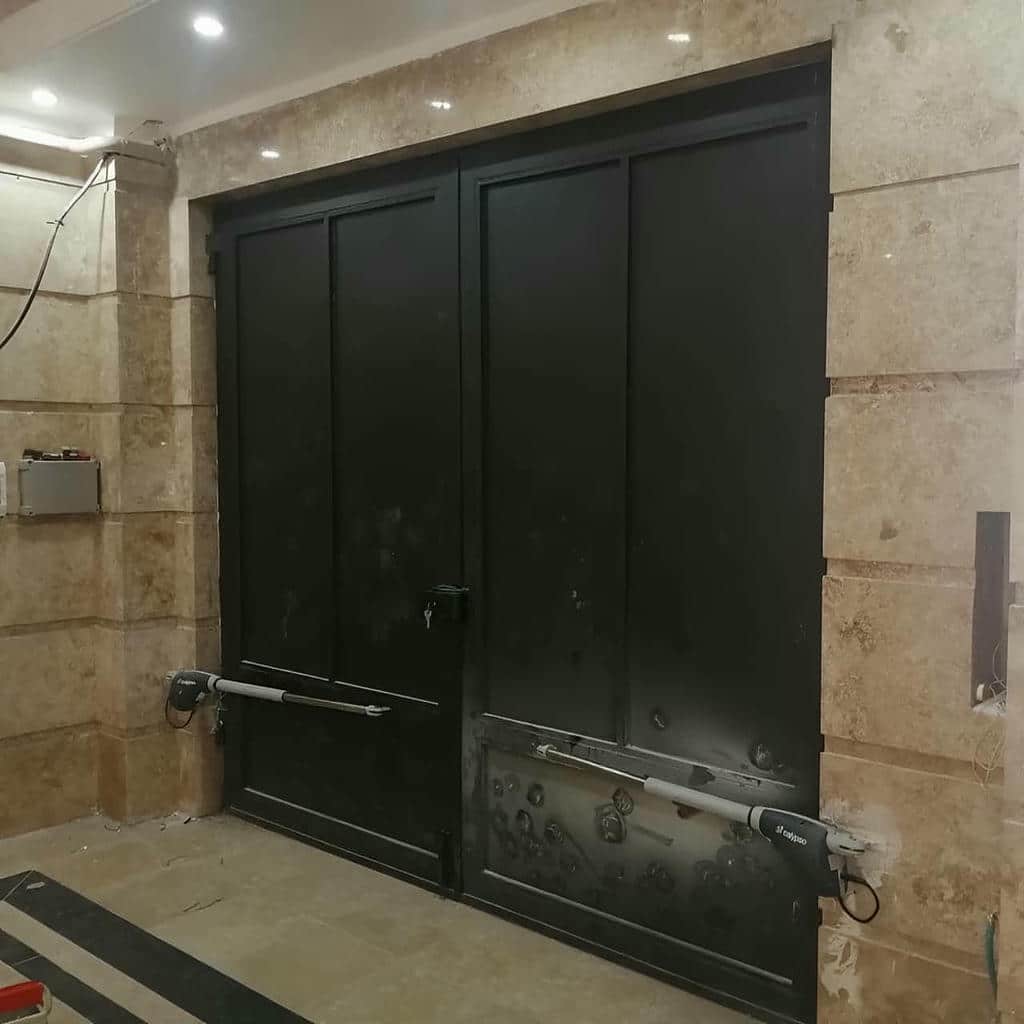 تعمیر جک درب حیاط سنگین شاسی دار با لرزش شاسی