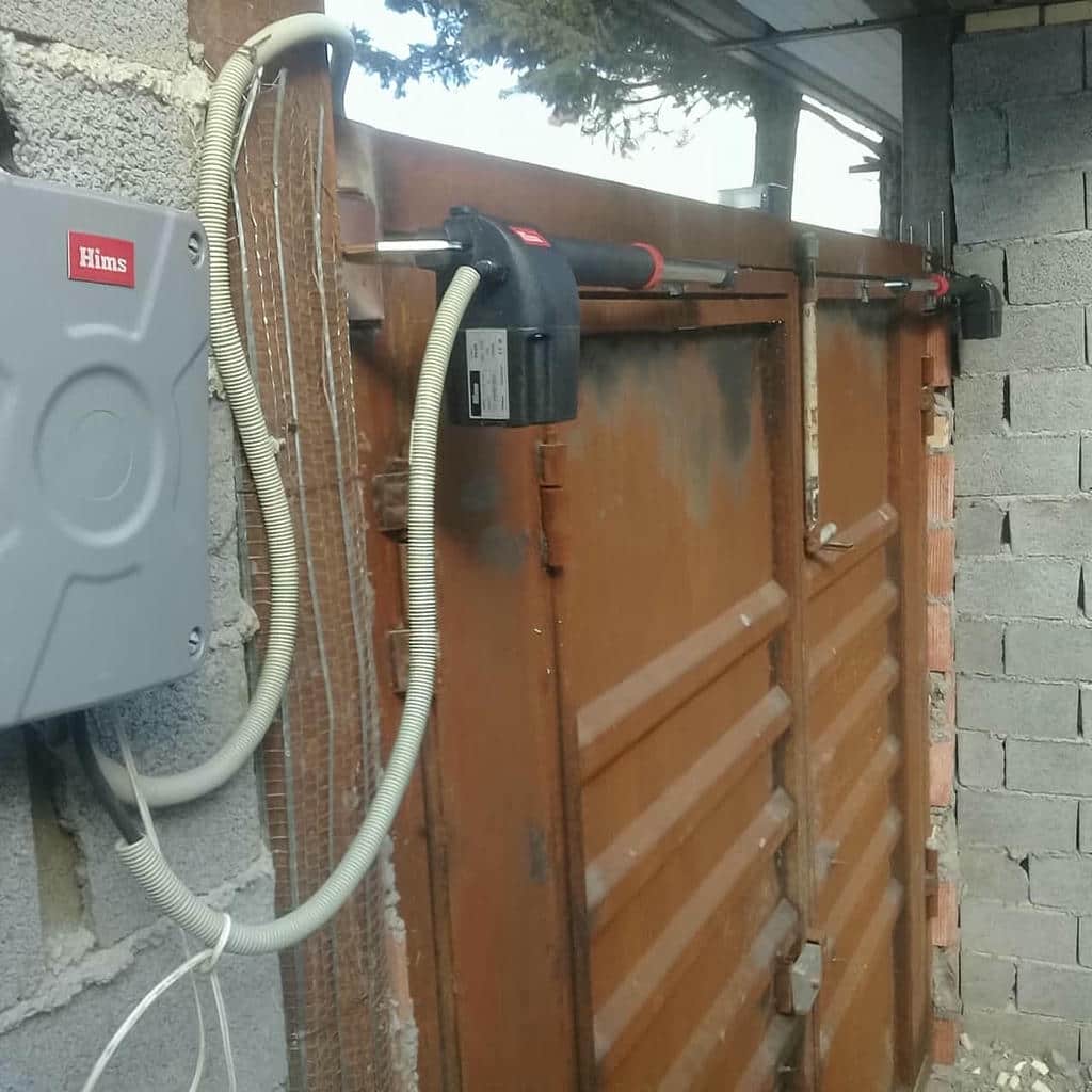 خدمات جک درب پارکینگ سنگین کورس بلند و تنظیم مدار