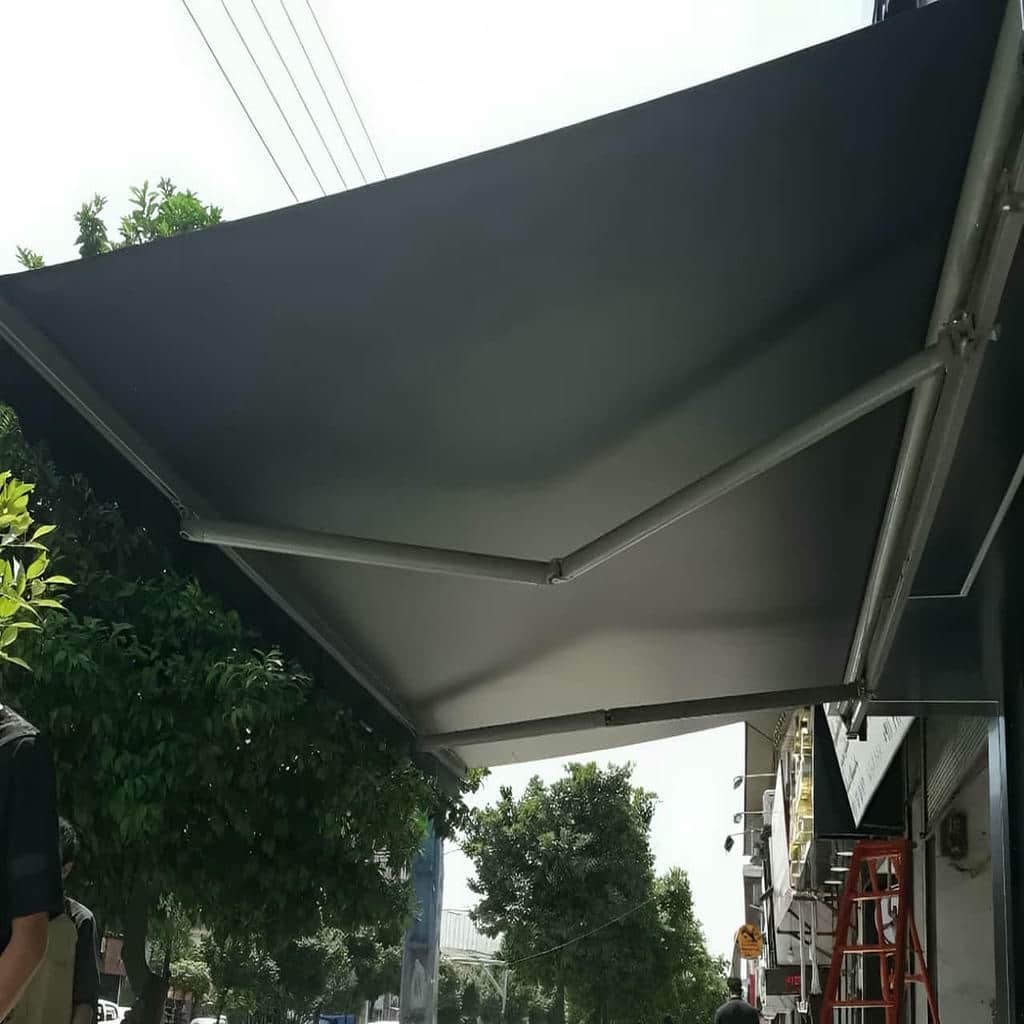 سایبان حیاط برقی با موتور مناسب مرکز فروش سایبان حیاط سفارشی برای موتور بازو پارچه و ریموت کنترل